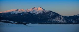 peak one over lake winter hero